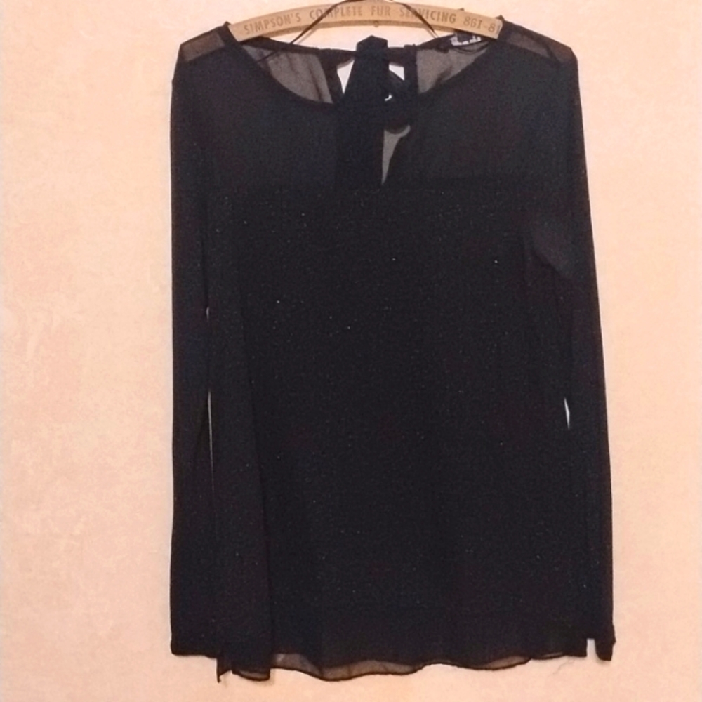 Sheer sparkle top with keyhole bow tie back and sheer panel neck and hem